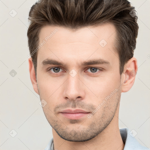 Neutral white young-adult male with short  brown hair and brown eyes