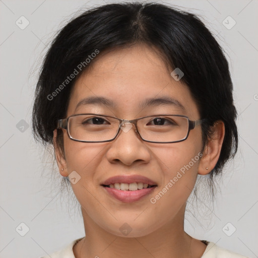 Joyful asian adult female with medium  brown hair and brown eyes