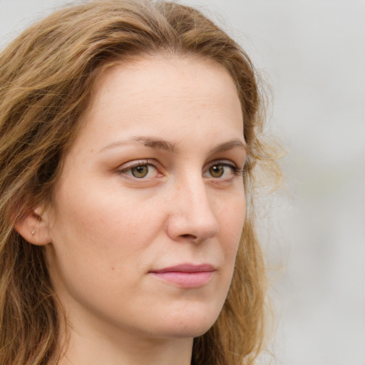 Neutral white young-adult female with long  brown hair and green eyes