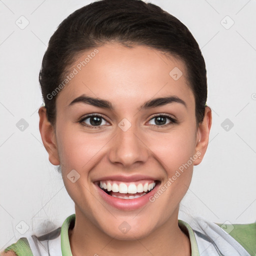 Joyful white young-adult female with short  brown hair and brown eyes