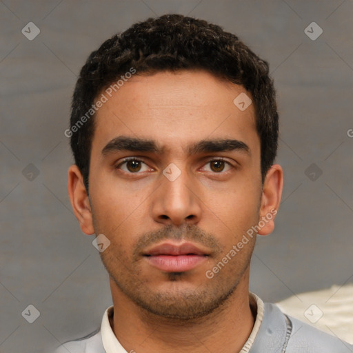 Neutral white young-adult male with short  black hair and brown eyes