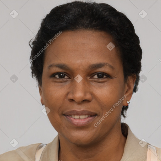 Joyful latino adult female with short  brown hair and brown eyes