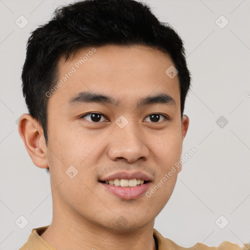 Joyful latino young-adult male with short  brown hair and brown eyes