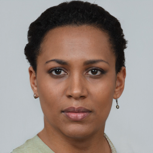 Neutral black young-adult female with short  black hair and brown eyes