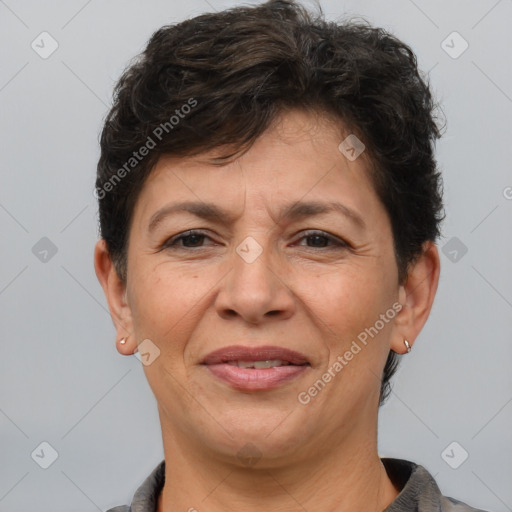 Joyful white adult female with short  brown hair and brown eyes