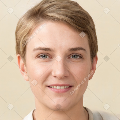 Joyful white young-adult female with short  brown hair and grey eyes