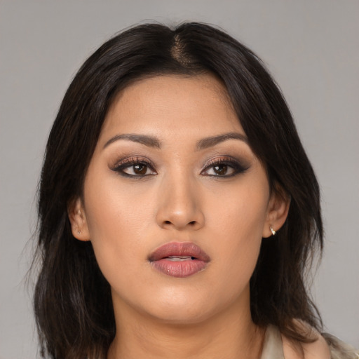 Neutral asian young-adult female with long  brown hair and brown eyes