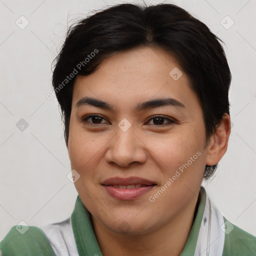 Joyful asian young-adult female with short  brown hair and brown eyes