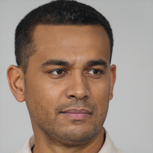 Neutral black young-adult male with short  brown hair and brown eyes