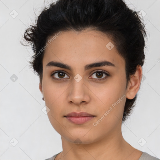 Neutral latino young-adult female with short  brown hair and brown eyes