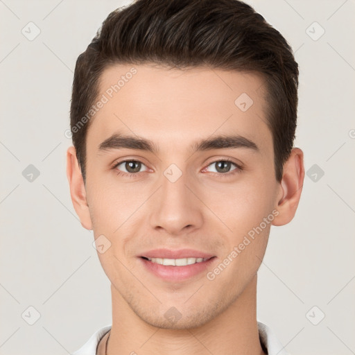 Joyful white young-adult male with short  brown hair and brown eyes