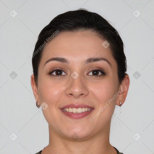 Joyful white young-adult female with short  brown hair and brown eyes