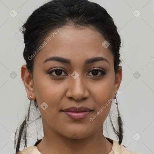 Joyful latino young-adult female with medium  brown hair and brown eyes