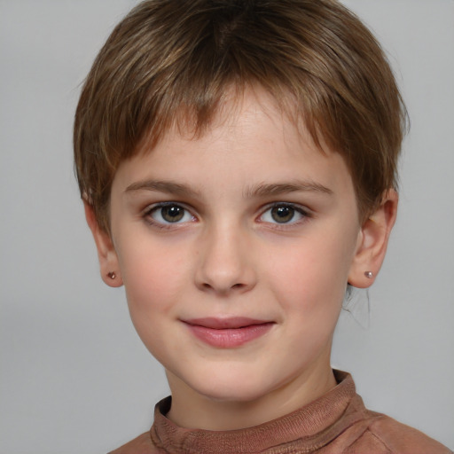 Joyful white child female with short  brown hair and grey eyes