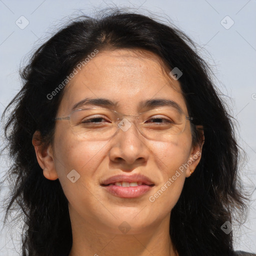 Joyful asian adult female with medium  brown hair and brown eyes