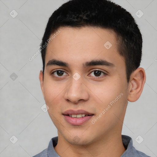 Joyful white young-adult male with short  black hair and brown eyes