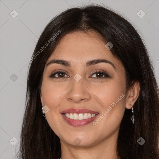 Joyful white young-adult female with long  brown hair and brown eyes