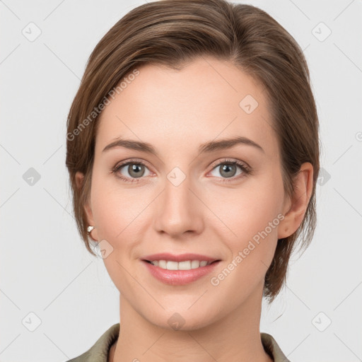 Joyful white young-adult female with medium  brown hair and grey eyes