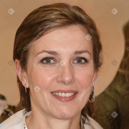 Joyful white adult female with medium  brown hair and grey eyes