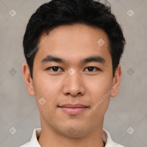 Joyful asian young-adult male with short  brown hair and brown eyes