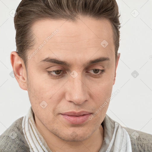 Joyful white adult male with short  brown hair and blue eyes