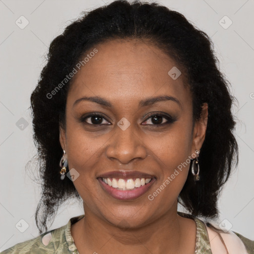 Joyful black young-adult female with medium  brown hair and brown eyes