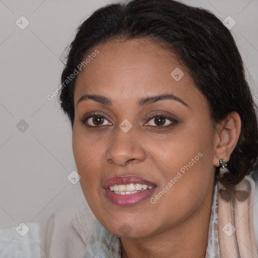 Joyful black young-adult female with medium  brown hair and brown eyes