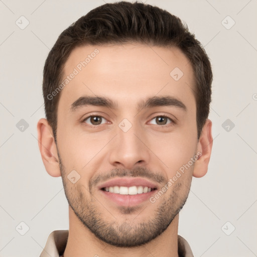 Joyful white young-adult male with short  brown hair and brown eyes