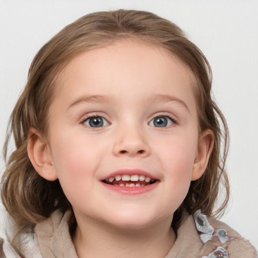 Joyful white child female with medium  brown hair and blue eyes