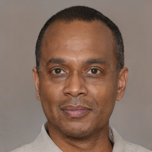 Neutral latino adult male with short  black hair and brown eyes