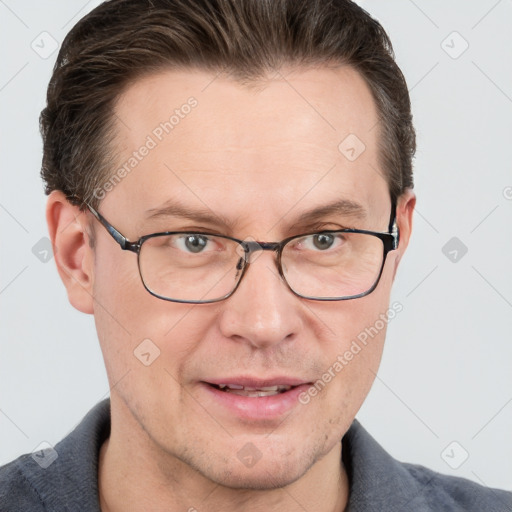 Joyful white adult male with short  brown hair and grey eyes