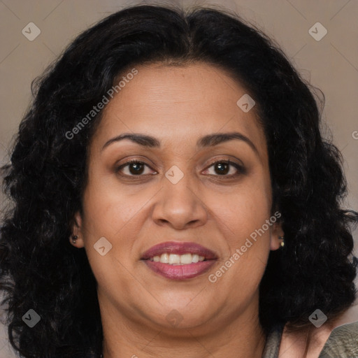 Joyful latino adult female with medium  brown hair and brown eyes