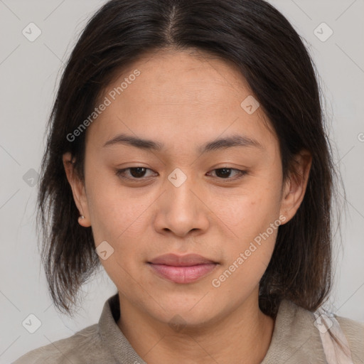 Joyful asian young-adult female with medium  brown hair and brown eyes