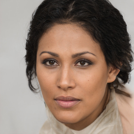 Neutral latino young-adult female with long  brown hair and brown eyes