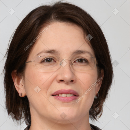 Joyful white adult female with medium  brown hair and grey eyes