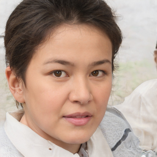 Neutral white young-adult female with medium  brown hair and brown eyes