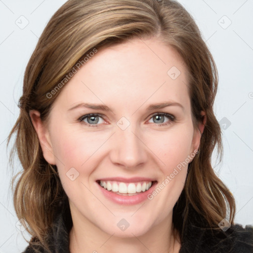 Joyful white young-adult female with medium  brown hair and blue eyes