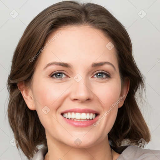 Joyful white young-adult female with medium  brown hair and grey eyes