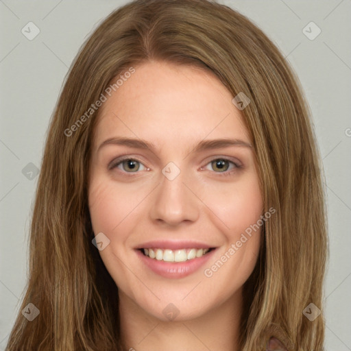 Joyful white young-adult female with long  brown hair and green eyes