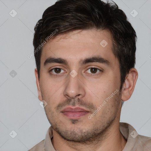 Neutral white young-adult male with short  brown hair and brown eyes