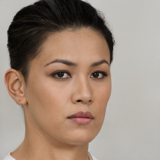 Neutral latino young-adult female with short  brown hair and brown eyes