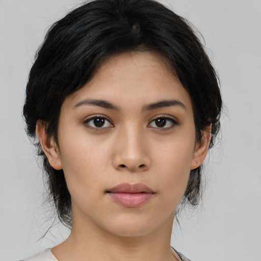 Neutral asian young-adult female with medium  black hair and brown eyes