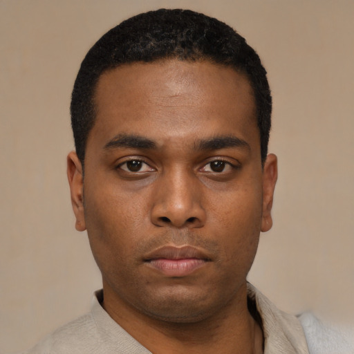 Neutral black young-adult male with short  black hair and brown eyes