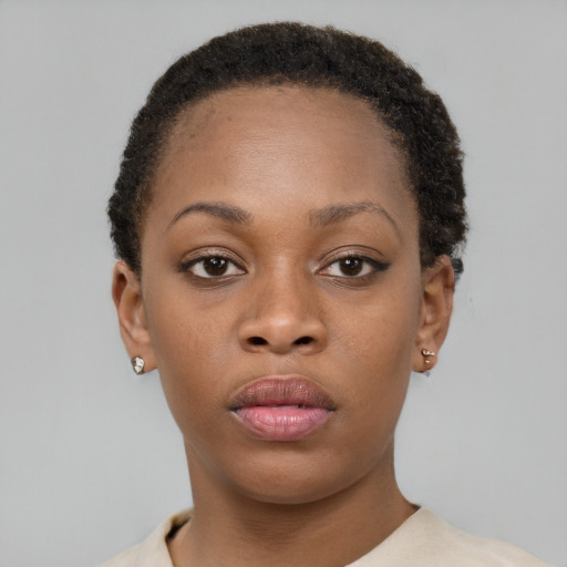 Neutral black young-adult female with short  brown hair and brown eyes