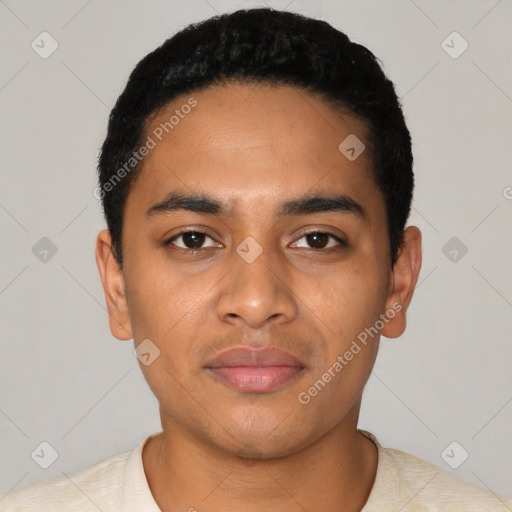 Joyful latino young-adult male with short  black hair and brown eyes