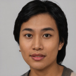 Neutral asian young-adult female with medium  black hair and brown eyes