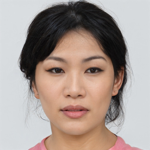 Neutral asian young-adult female with medium  black hair and brown eyes