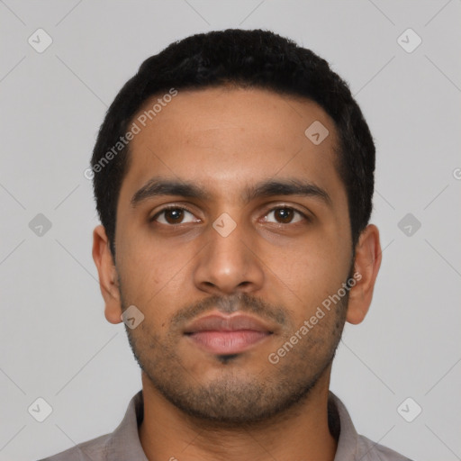 Neutral latino young-adult male with short  black hair and brown eyes