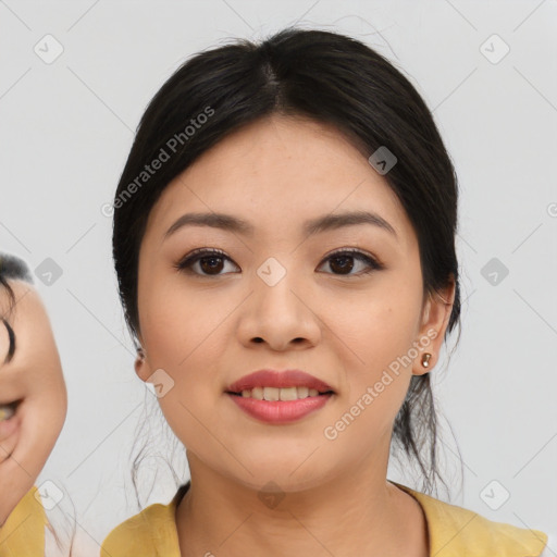 Joyful asian young-adult female with medium  black hair and brown eyes