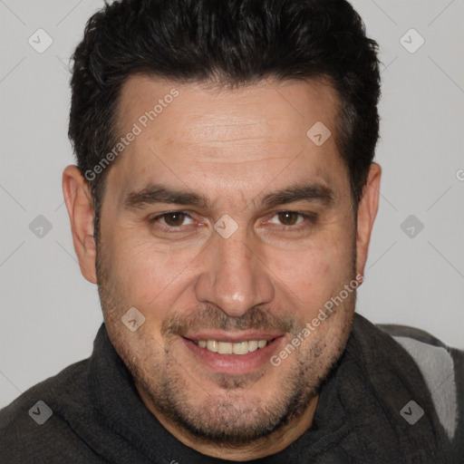 Joyful white adult male with short  brown hair and brown eyes